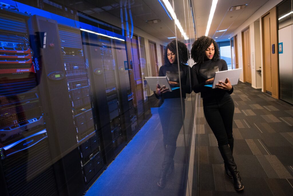 woman standing in front of server room